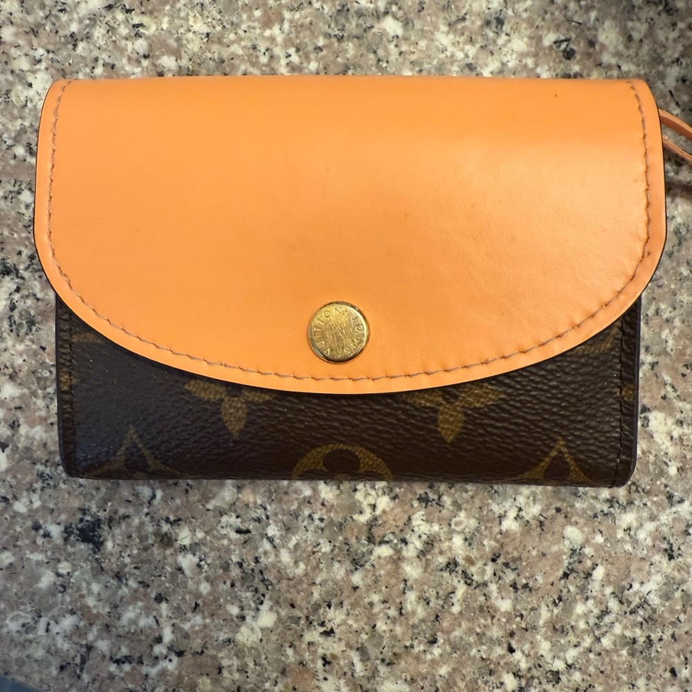 Authentic Lv Rosalie coin purse. Excellent condition. Receipt, box and dust bag